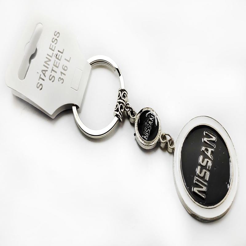 ميدالية وسلسلة مفاتيح من الستانلس ستيل   بتصميم لوجو  نيسان
