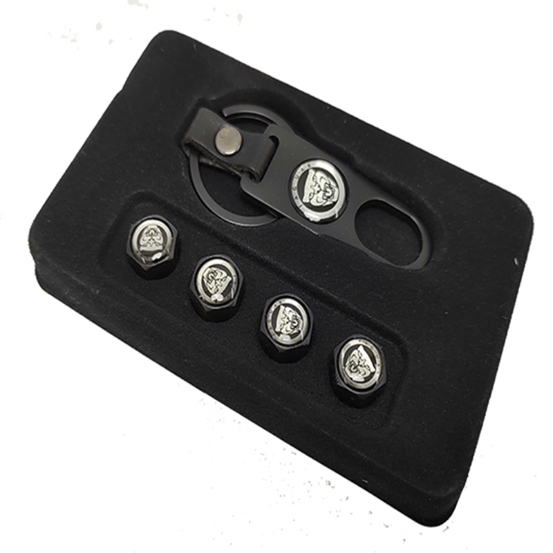 طقم غطاء بلف اطارات السيارة مع ميدالية مفتاح بلف بشعار متوافقة مع جاكور