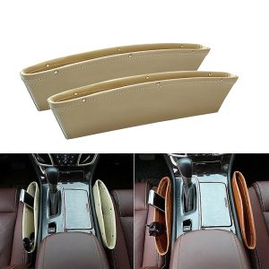 منظم للسيارة للنقود والمفاتيح والجوال لإزالة الفوضى وجعل السيارة أكثر تنظيمًا ، منظم جيب لوحدة التحكم، حامل ومنظم تخزين داخلي يوضع في الفجوة الجانبية للمقعد (جلد بيج - عبوة من 2 قطعة)