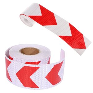 شريط عاكس ، تقنية منشورية مع مكعبات من البلورات الدقيقة يزيد من السطوع ويكون واضحًا بشكل في الليل (عش النحل سهم احمر ابيض ، طول 5 متر، عرض 5 سم)