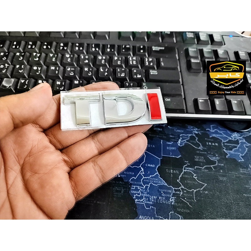 ملصق ستيكر شعار السيارة ثلاثي الابعاد معدن ، ملصق شارة لتزيين صندوق السيارة(متوافق مع فولكس TDI ، مقاس 8 سم فى 3 سم ، كود: 10403) 5 ملصق ستيكر شعار السيارة ثلاثي الابعاد معدن ، ملصق شارة لتزيين صندوق السيارة(متوافق مع فولكس TDI ، مقاس 8 سم فى 3 سم ، كود: 10403) - الصورة 5