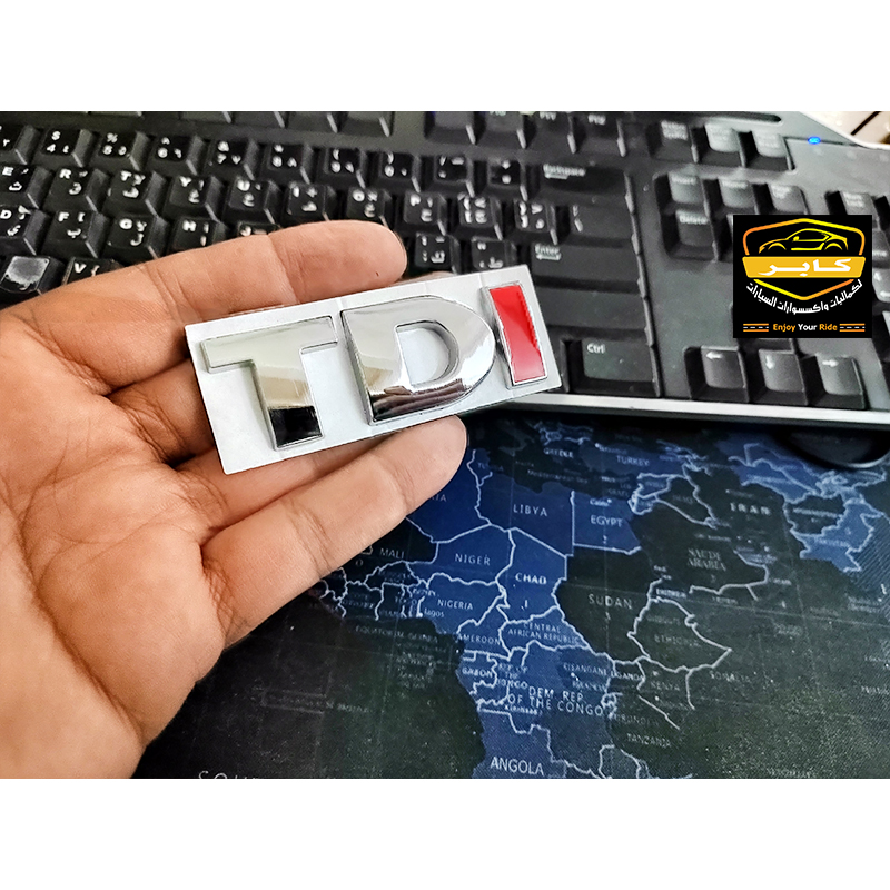 ملصق ستيكر شعار السيارة ثلاثي الابعاد معدن ، ملصق شارة لتزيين صندوق السيارة(متوافق مع فولكس TDI ، مقاس 8 سم فى 3 سم ، كود: 10403) 4 ملصق ستيكر شعار السيارة ثلاثي الابعاد معدن ، ملصق شارة لتزيين صندوق السيارة(متوافق مع فولكس TDI ، مقاس 8 سم فى 3 سم ، كود: 10403) - الصورة 4